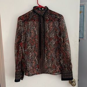 Tucci floral see thru shirt.